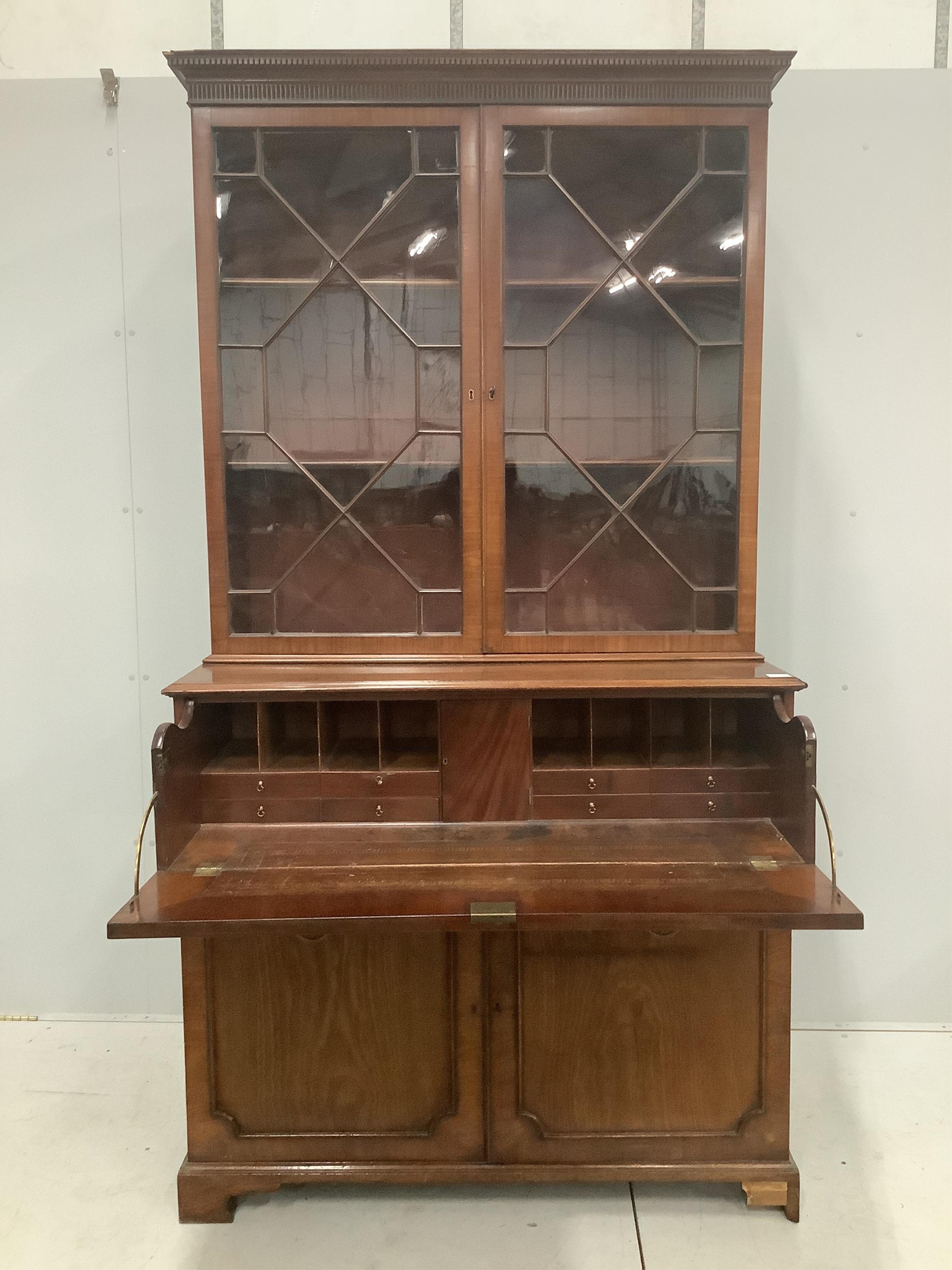 A George IV mahogany secretaire bookcase, width 118cm, depth 59cm, height 220cm. Condition - fair to good